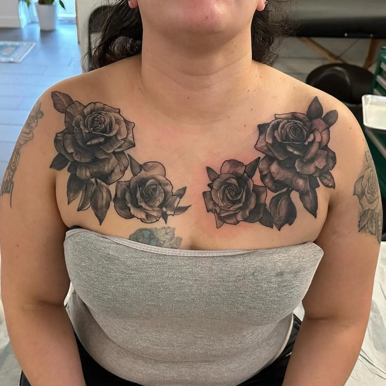 Cover up chest tattoo complete. Roses cover poorly done lettering