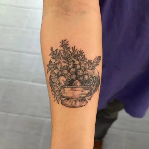 Cover up tattoo. Minimalism fruit basket covering an old flower