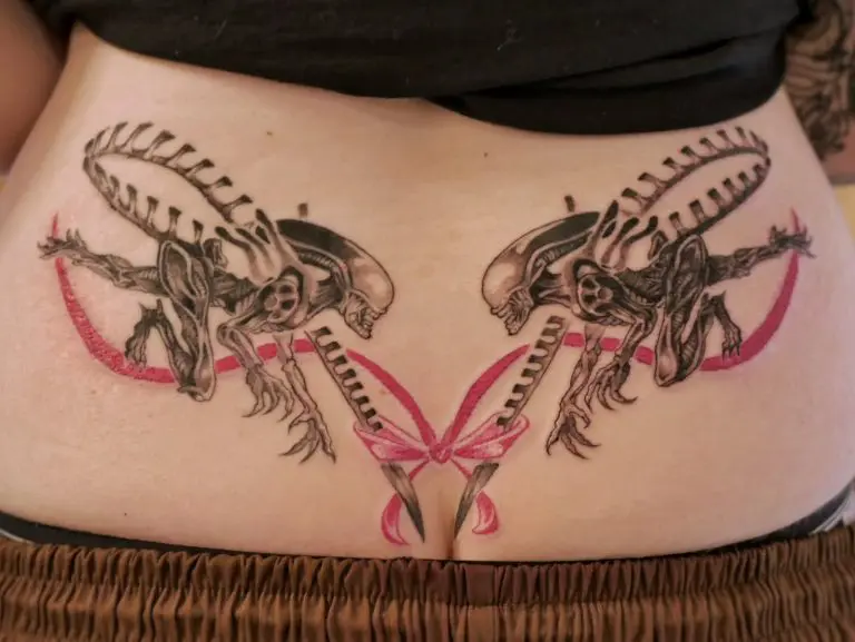 Symmetrical biomechanical back piece with pink ribbon by Birdy