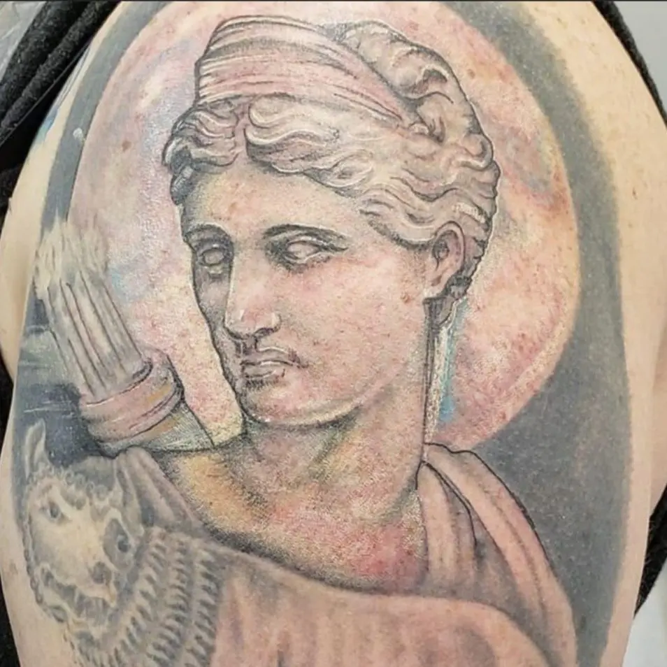 Before and after rework tattoo of a statuary head